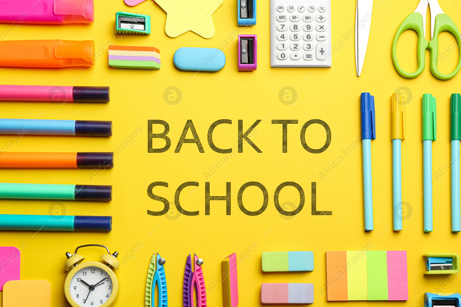 Image of Text Back To School and different stationery on yellow background, flat lay 