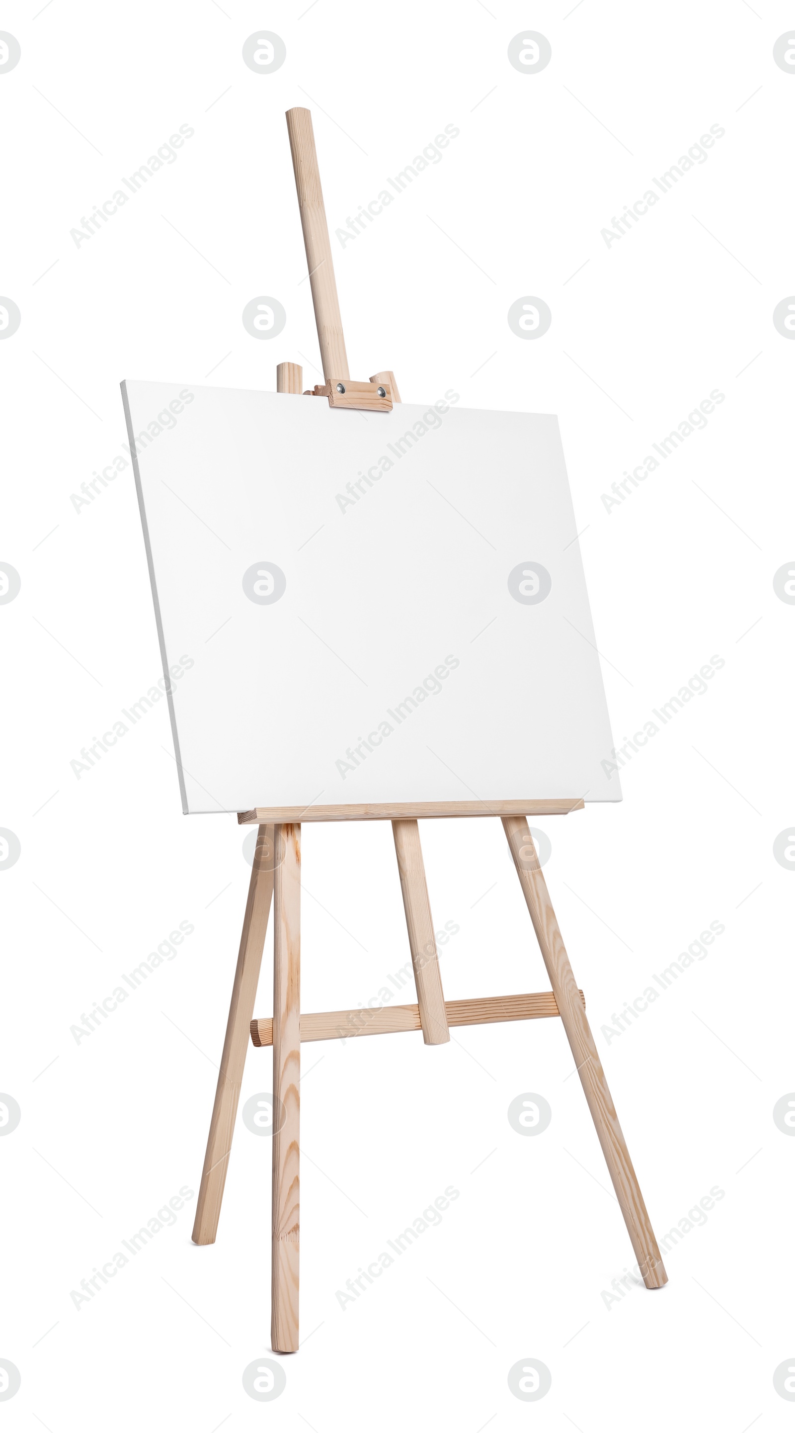 Photo of Wooden easel with canvas isolated on white. Artist's equipment