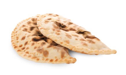 Photo of Two delicious stuffed calzones on white background
