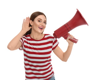 Young woman with megaphone on white background