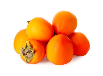 Delicious ripe juicy persimmons on white background