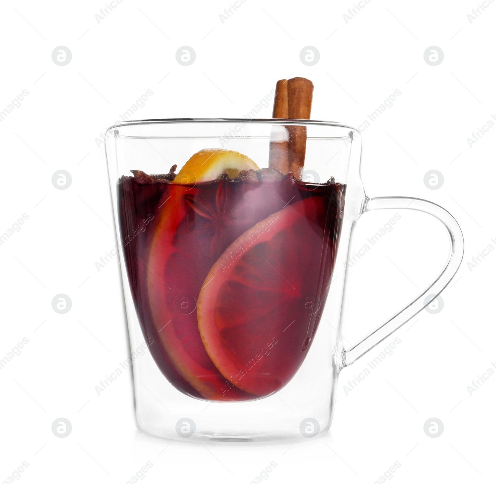 Photo of Cup with red mulled wine against white background