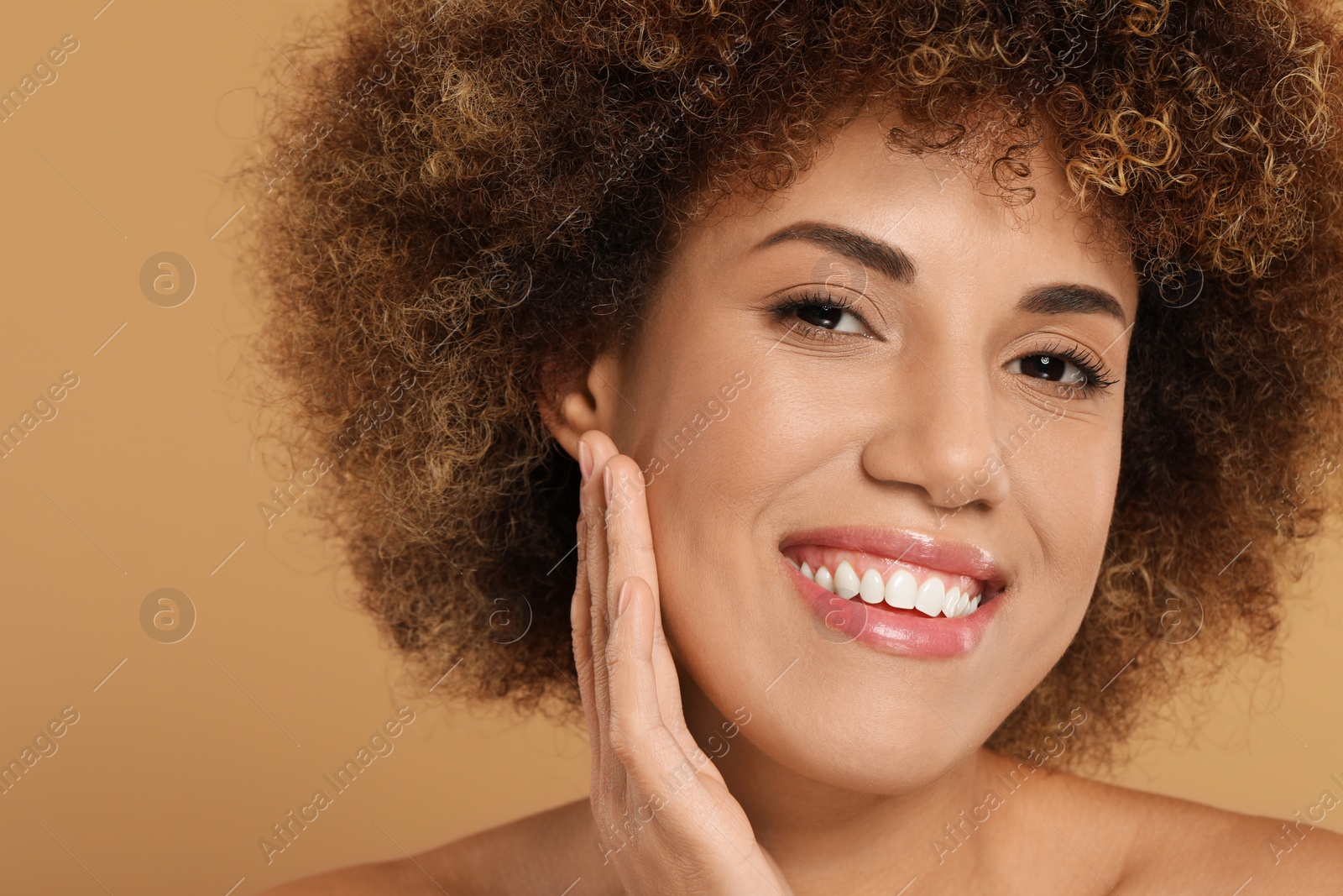 Photo of Beautiful woman with healthy skin on beige background, closeup