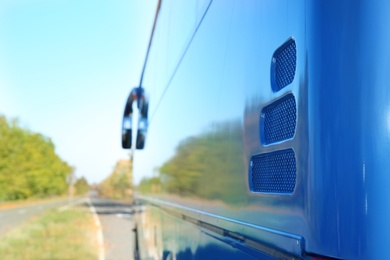 Modern blue bus on road. Passenger transportation