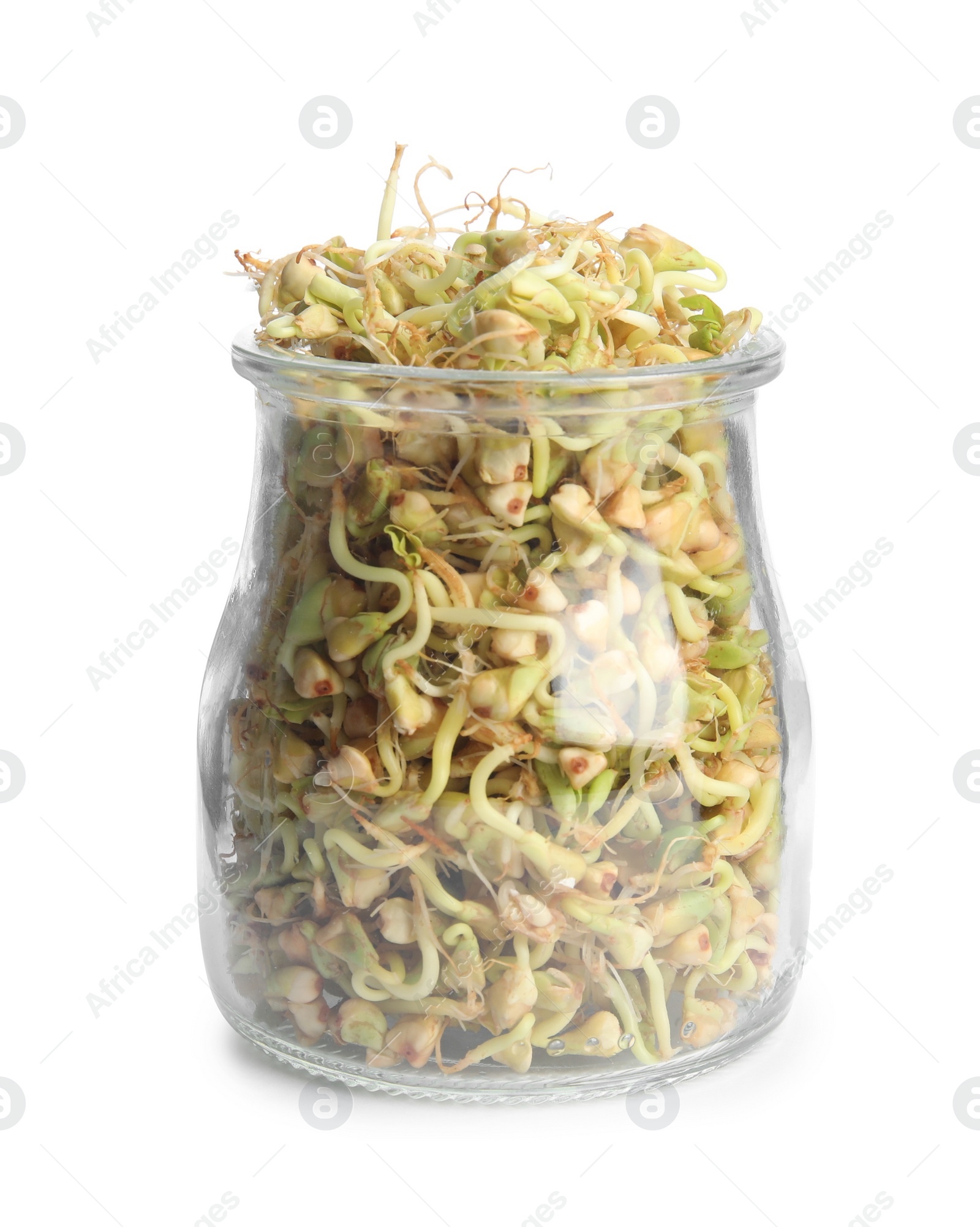 Photo of Glass jar of sprouted green buckwheat isolated on white