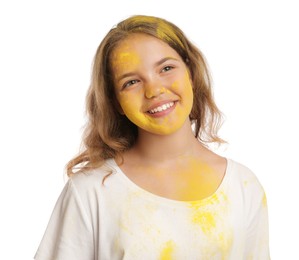 Teen girl covered with yellow powder dye on white background. Holi festival celebration