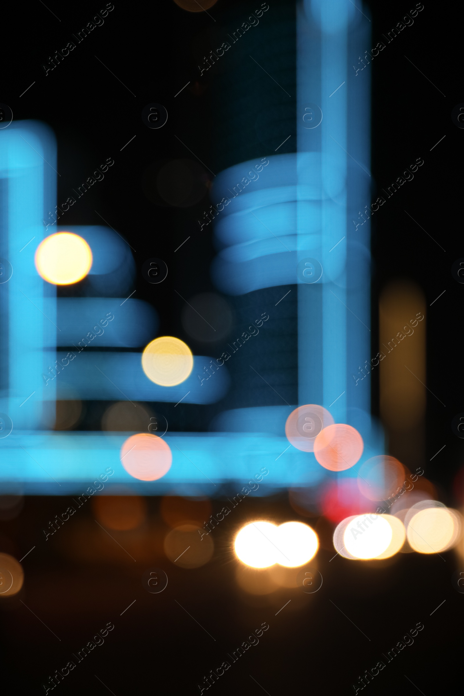 Photo of Blurred view of cityscape with bokeh effect. Night life