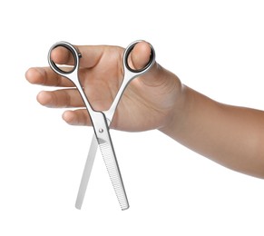 Photo of Hairdresser holding professional thinning scissors isolated on white, closeup. Haircut tool