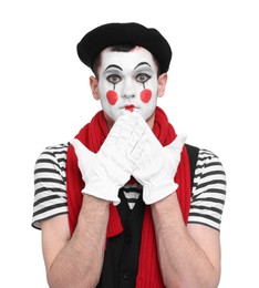Photo of Mime artist making shocked face on white background