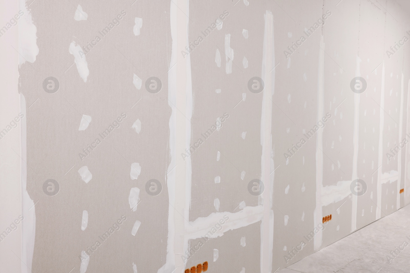 Photo of Wall with putty in room. Home renovation