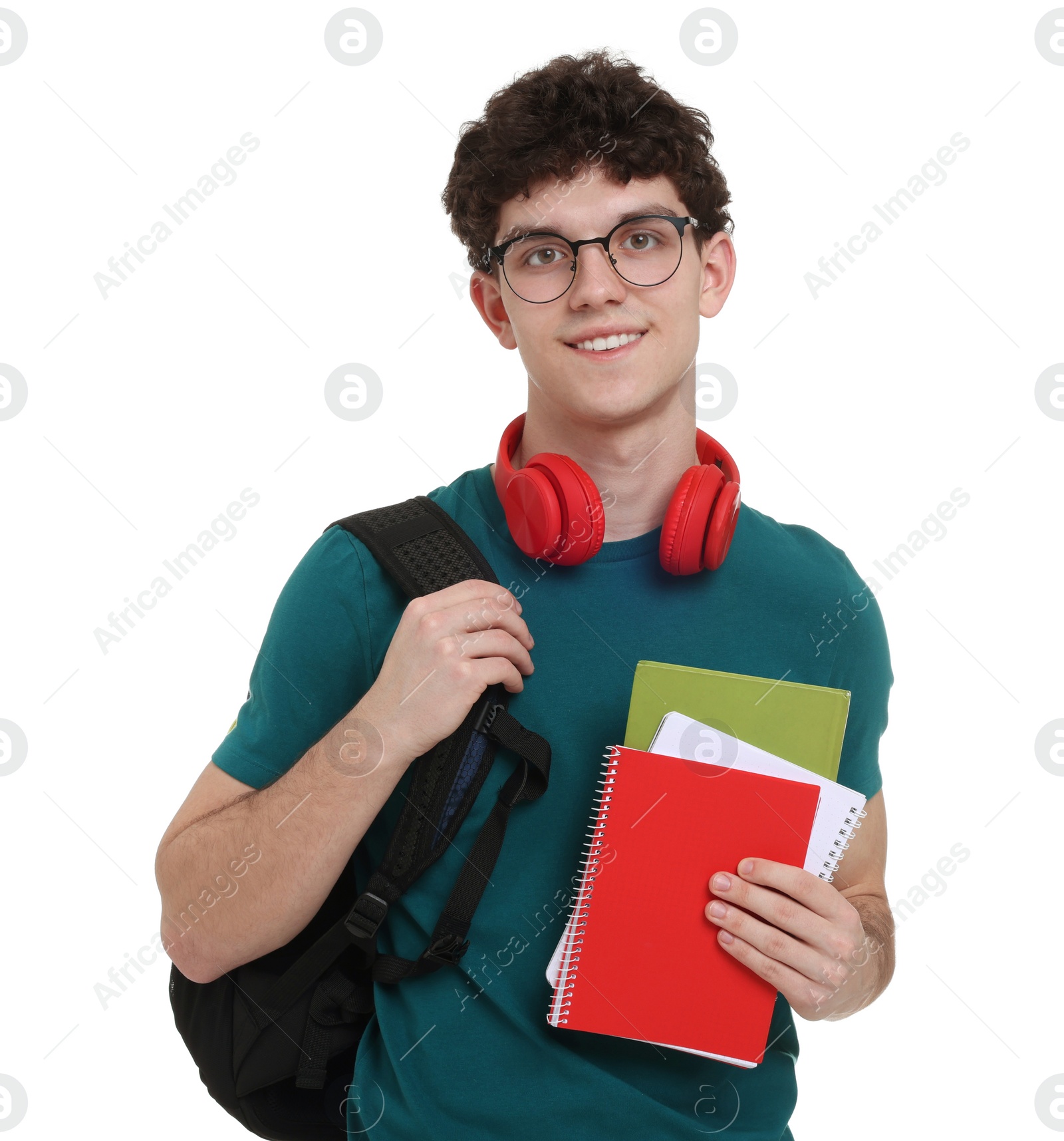 Photo of Portrait of student with backpack, notebooks and headphones on white background