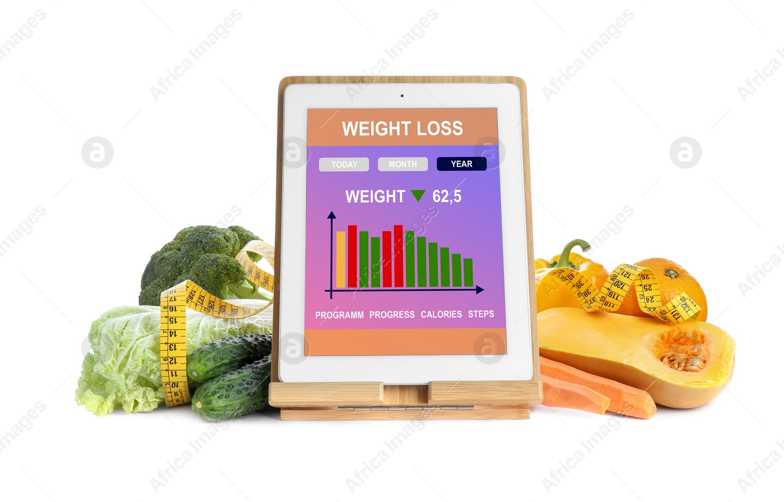 Photo of Tablet with weight loss calculator application and food products on white background