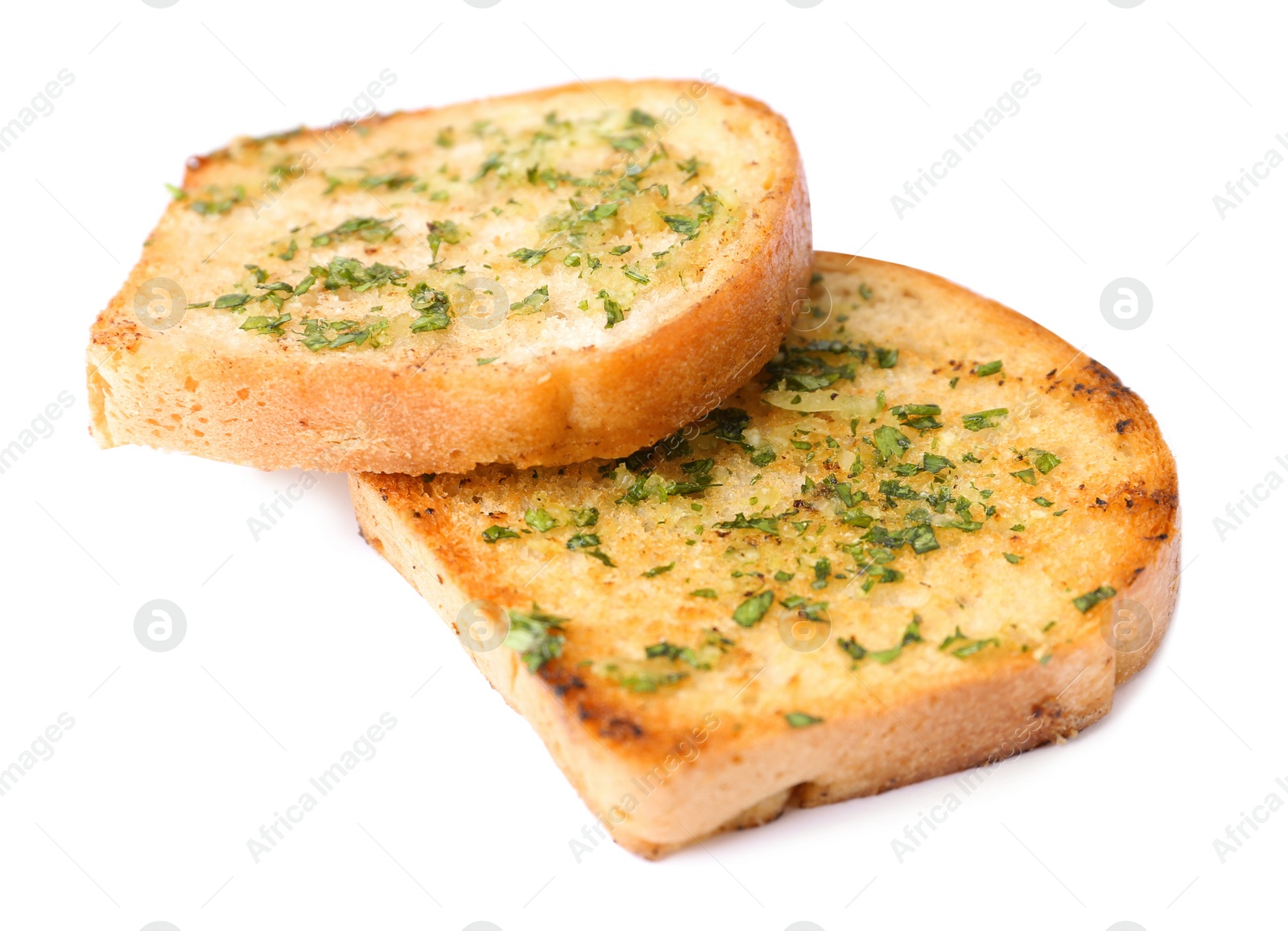 Photo of Slices of toasted bread with garlic and herbs on white background