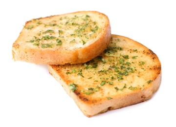 Photo of Slices of toasted bread with garlic and herbs on white background