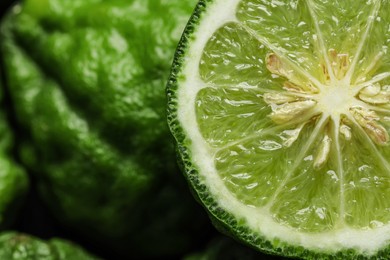 Whole and cut ripe bergamot fruits, closeup