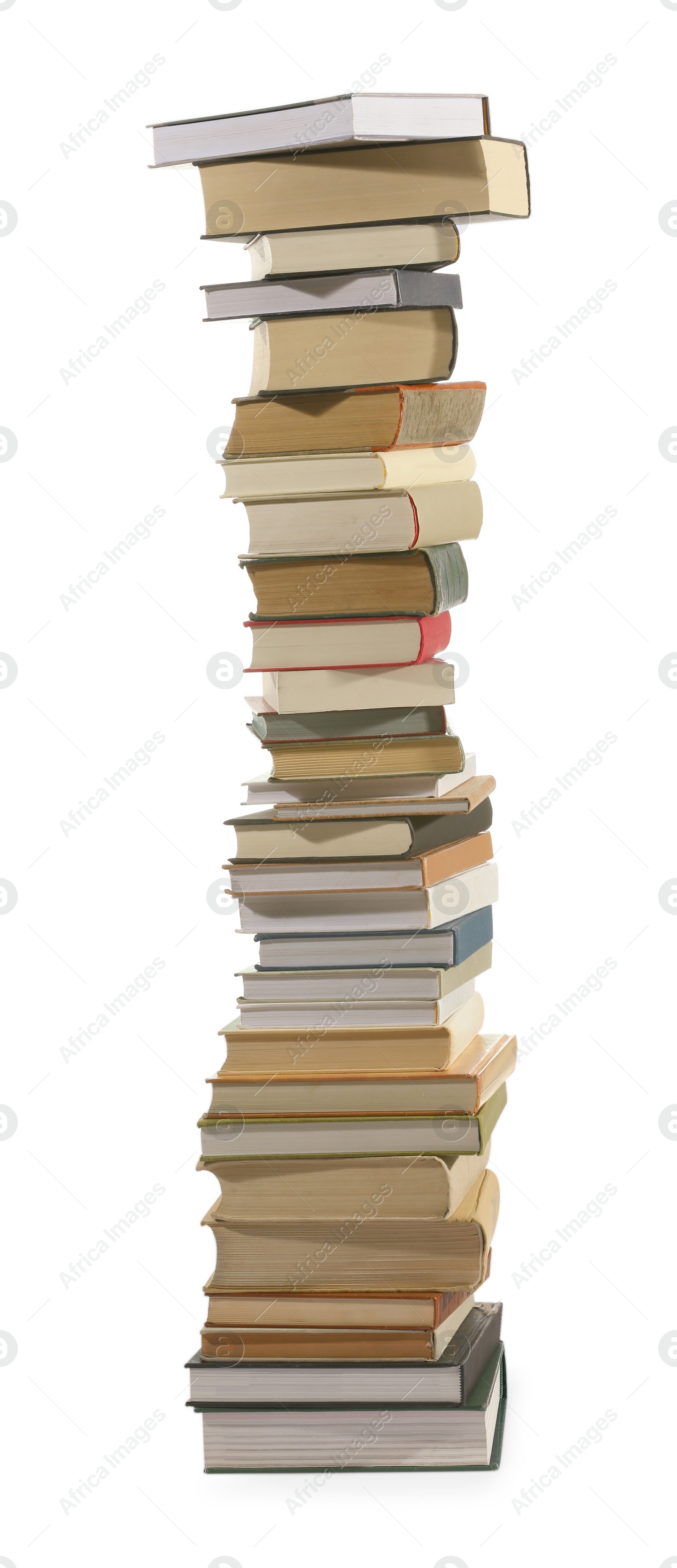 Photo of High stack of many different books isolated on white