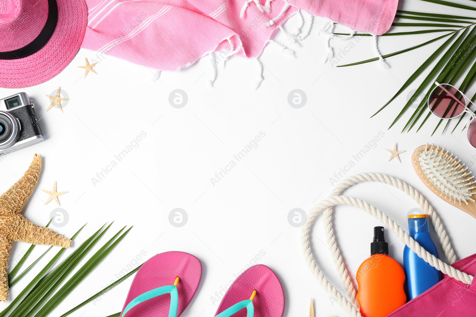 Photo of Beach accessories on white background, top view. Space for text