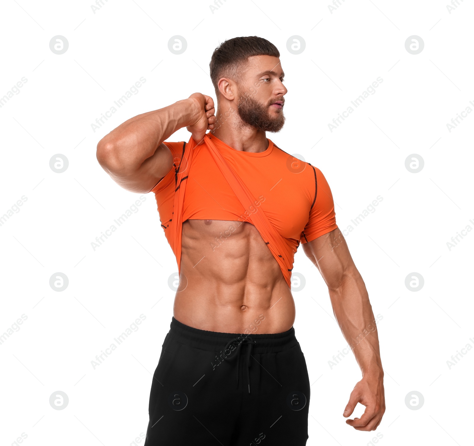 Photo of Young bodybuilder showing his muscular body on white background