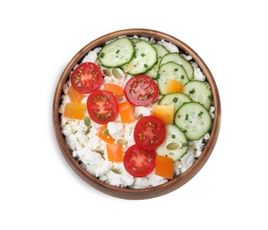 Photo of Fresh cottage cheese with vegetables in bowl isolated on white, top view