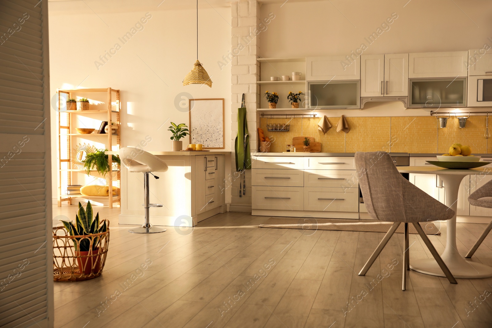 Photo of Modern kitchen interior with stylish white furniture