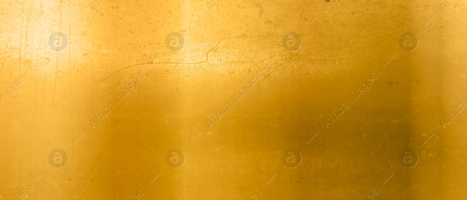 Image of Shiny gold surface as background, closeup view