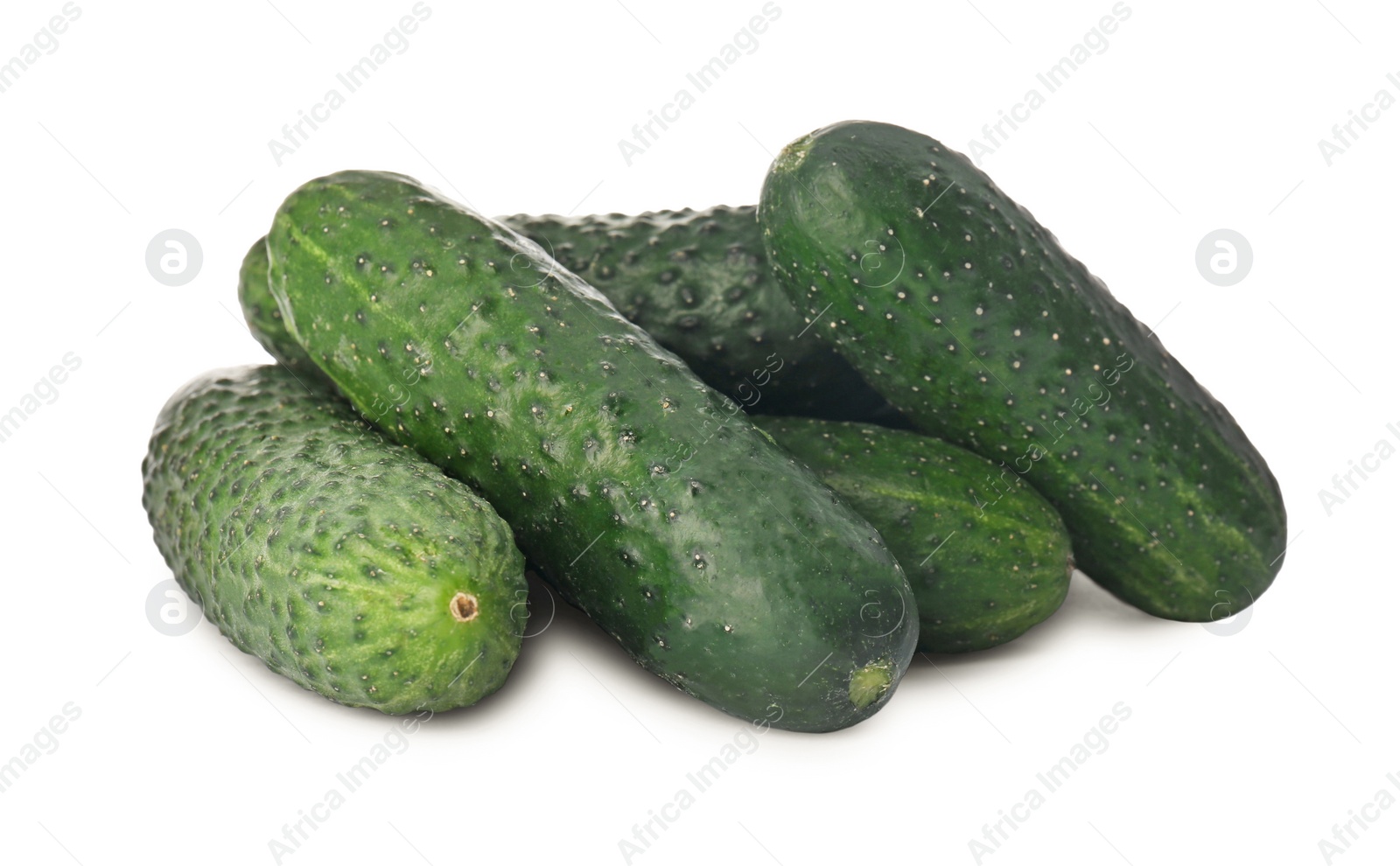 Photo of Whole fresh green cucumbers on white background