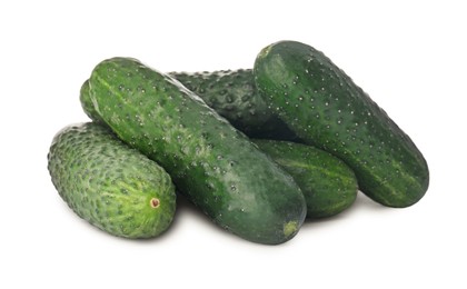 Whole fresh green cucumbers on white background