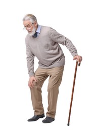 Photo of Tired senior man with walking cane on white background