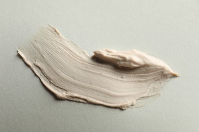 Photo of Sample of face mask on light background, top view