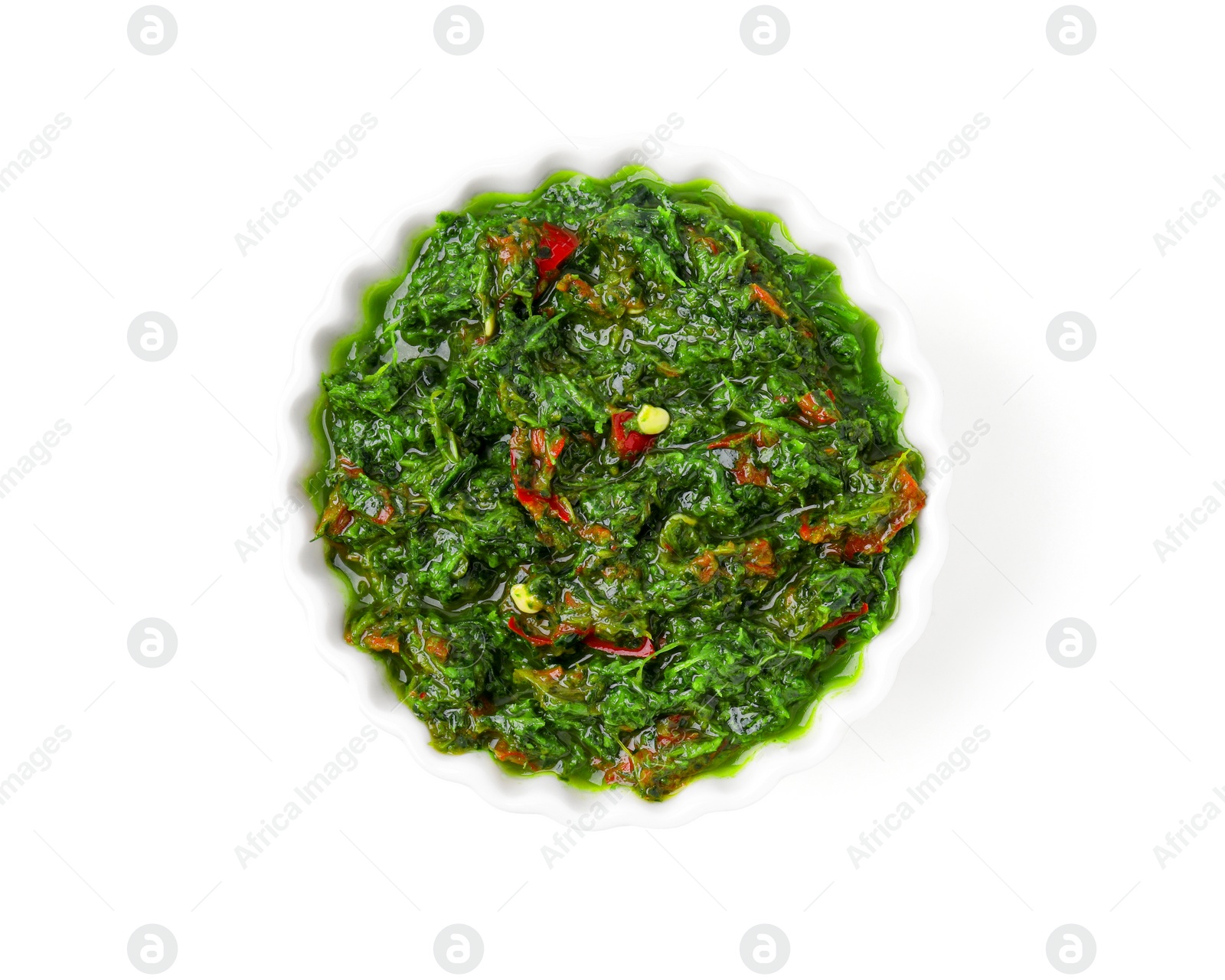 Photo of Fresh marinade in bowl isolated on white, top view