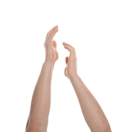 Man extending hands on white background, closeup