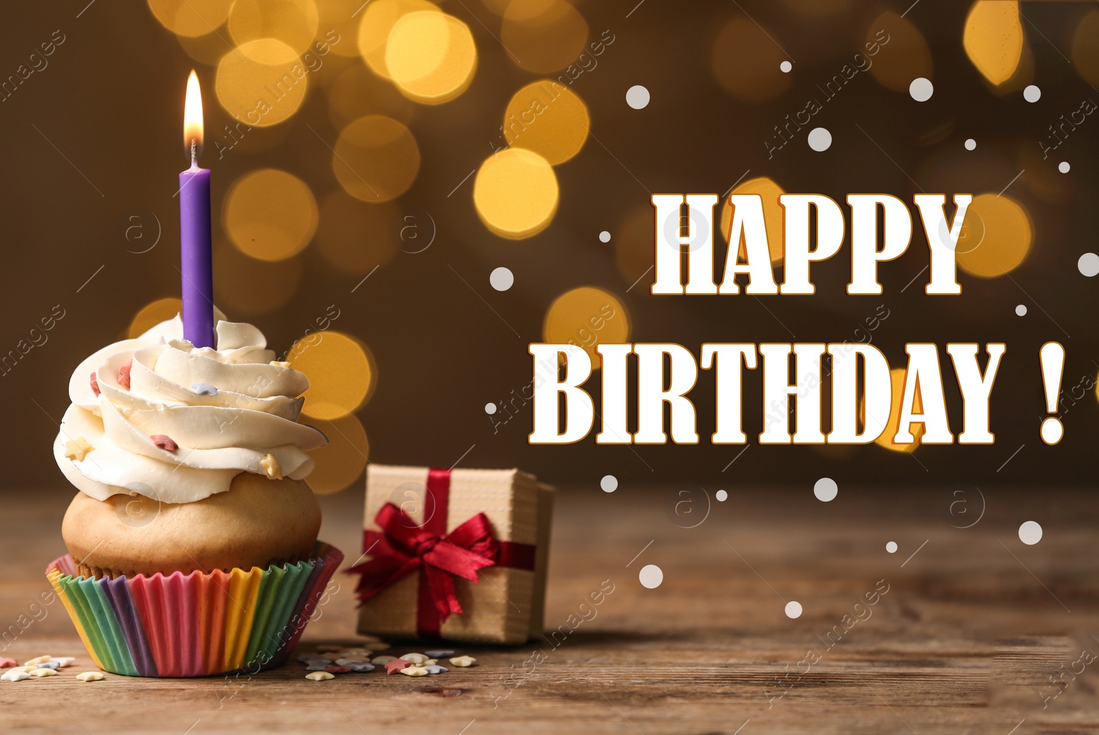 Image of Text Happy Birthday, gift box and delicious cupcake with candle on blurred background