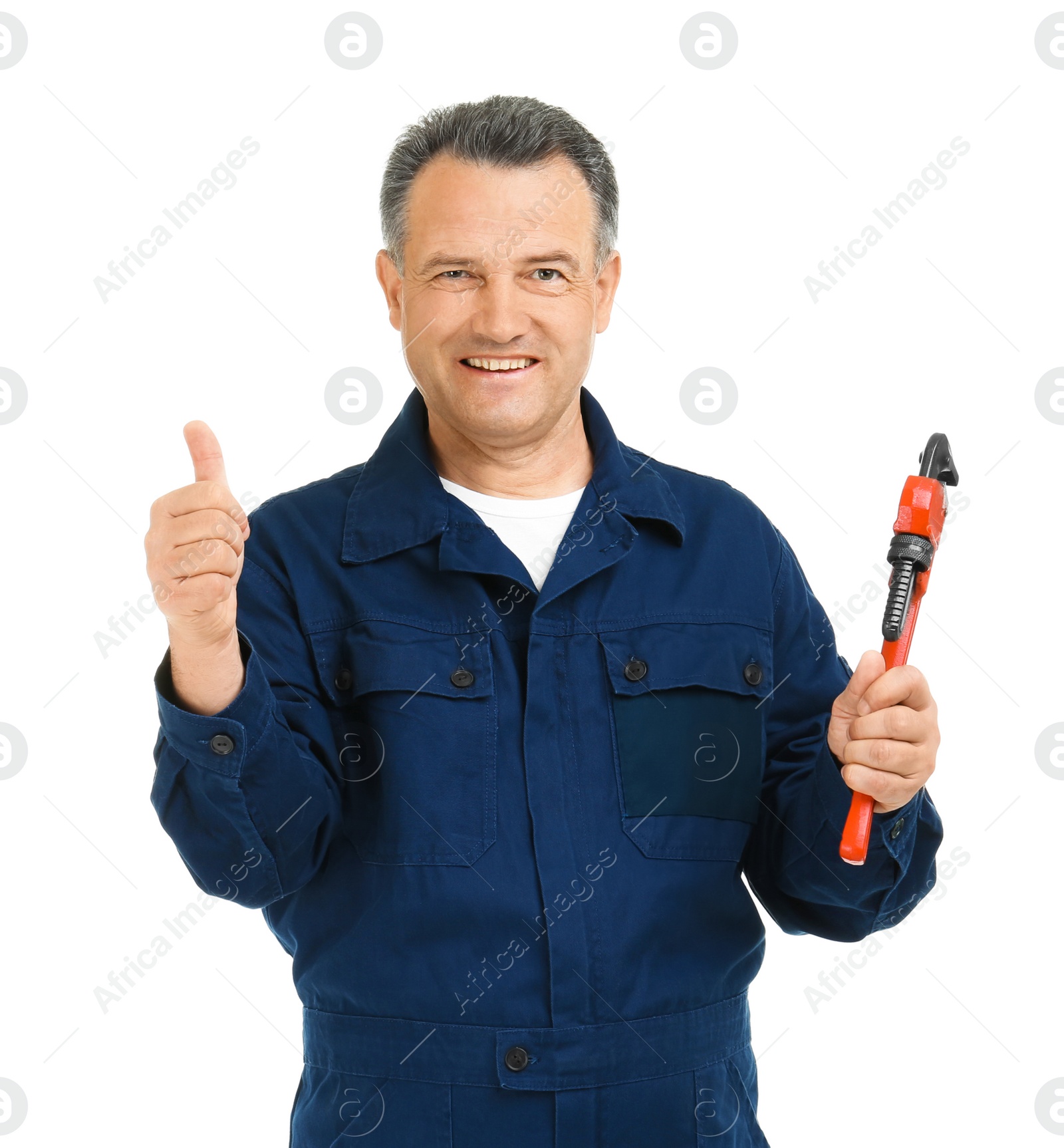 Photo of Mature plumber with pipe wrench on white background