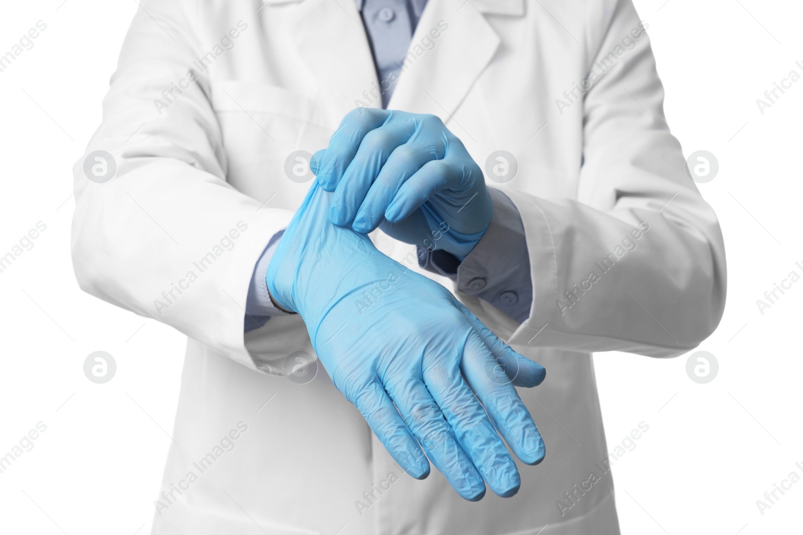 Photo of Doctor wearing light blue medical gloves on white background, closeup