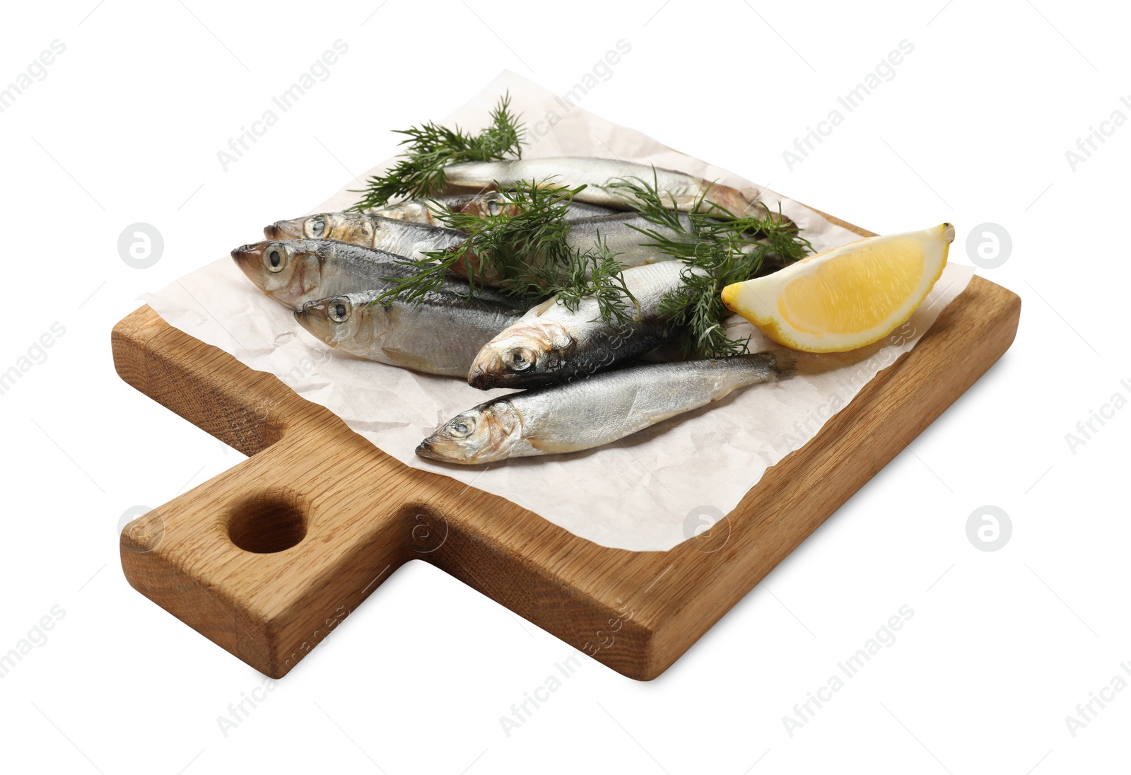 Photo of Fresh raw sprats, dill and cut lemon isolated on white