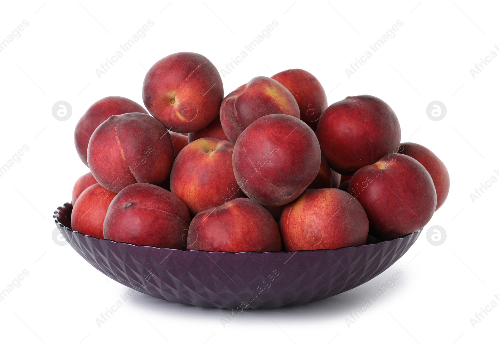 Photo of Bowl of delicious ripe peaches isolated on white