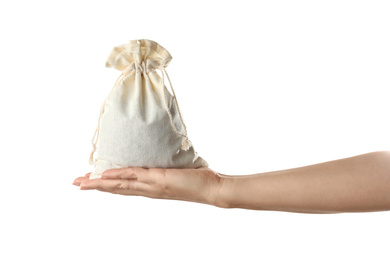 Photo of Woman holding full cotton eco bag on white background, closeup