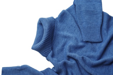 Blue turtleneck sweater on white background, closeup