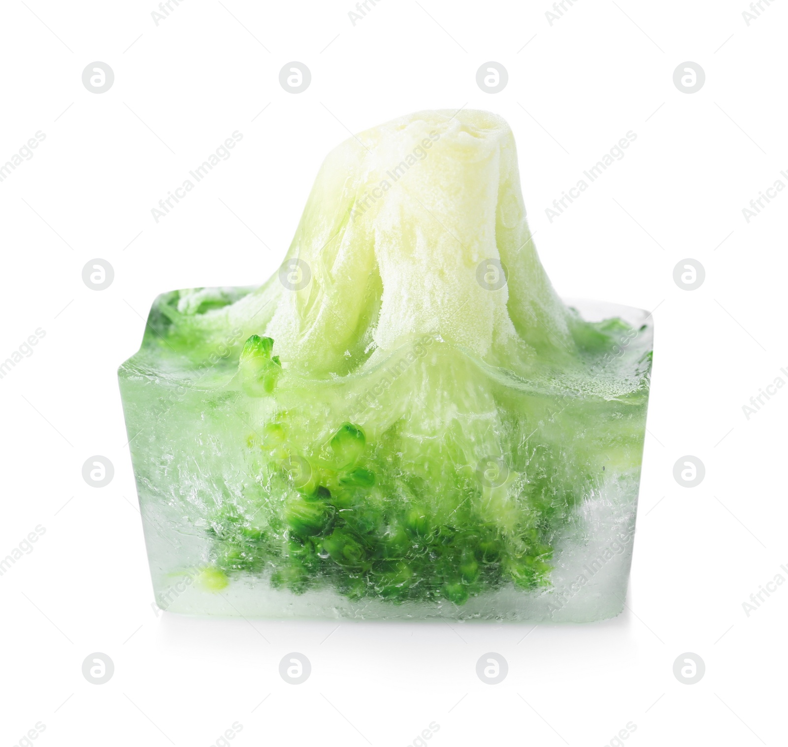 Photo of Fresh broccoli in ice cube on white background. Frozen vegetables