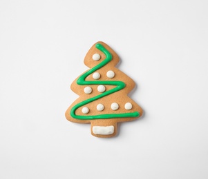 Photo of Tasty homemade Christmas cookie on white background, top view