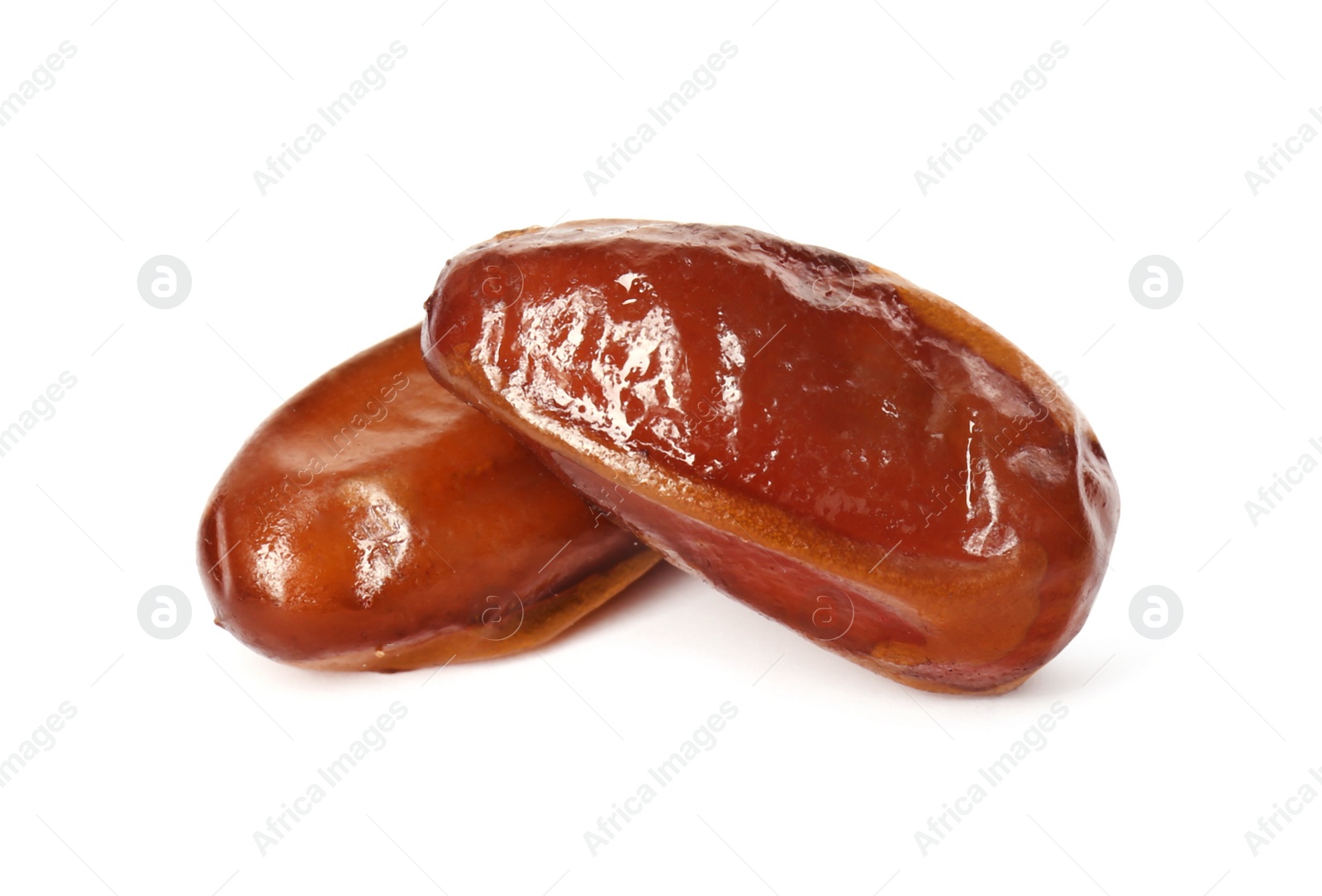 Photo of Two tasty sweet dried dates on white background