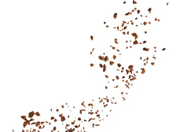 Photo of Pouring aromatic instant coffee on white background