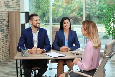 Human resources commission conducting job interview with applicant in office