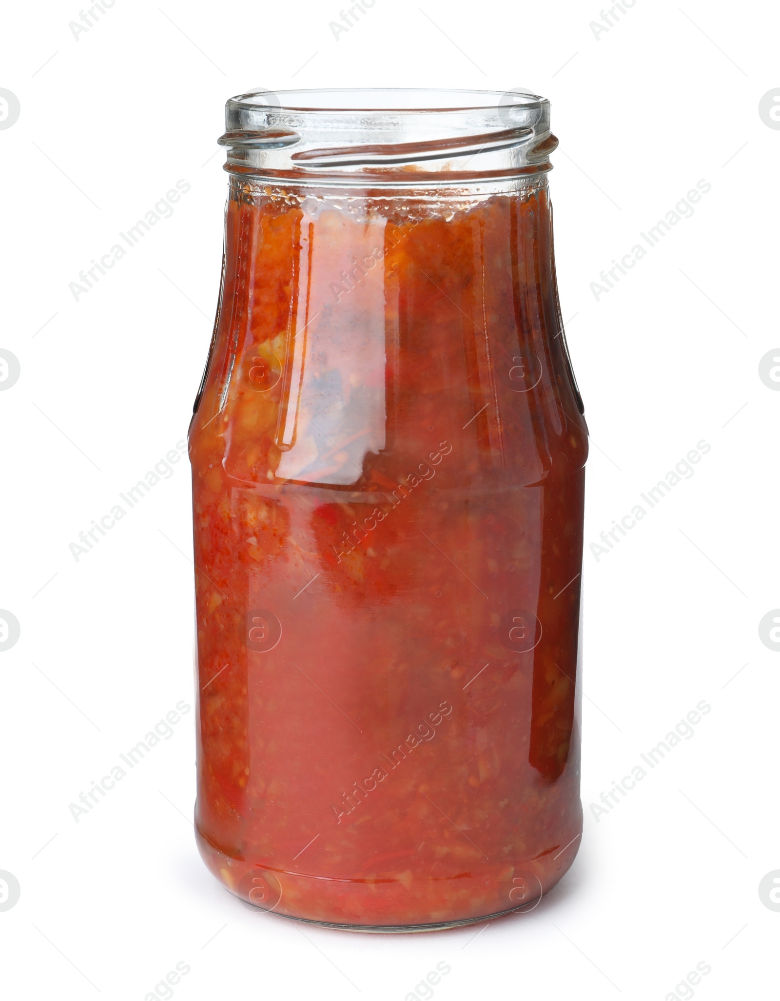 Photo of Glass jar with pickled red sauce isolated on white