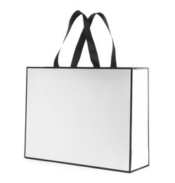 Photo of One paper bag isolated on white. Mockup for design