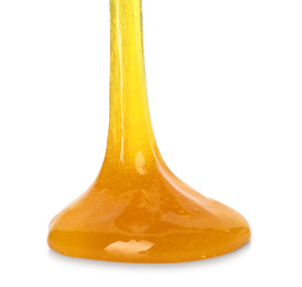 Photo of Flowing orange slime on white background. Antistress toy