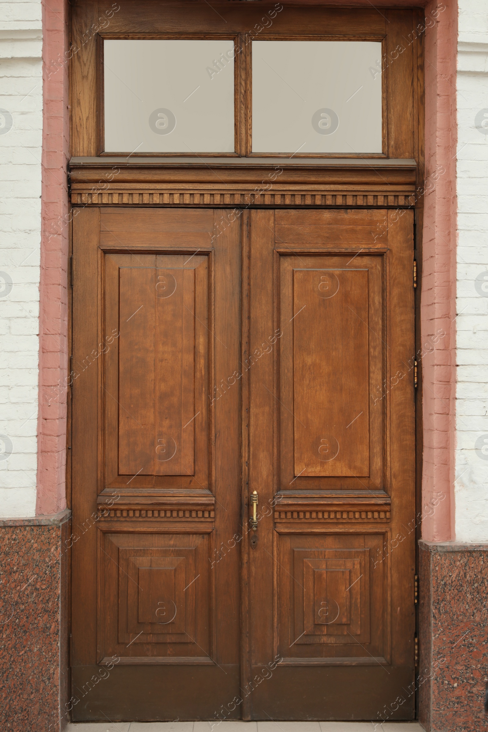 Photo of Building with vintage wooden door. Exterior design