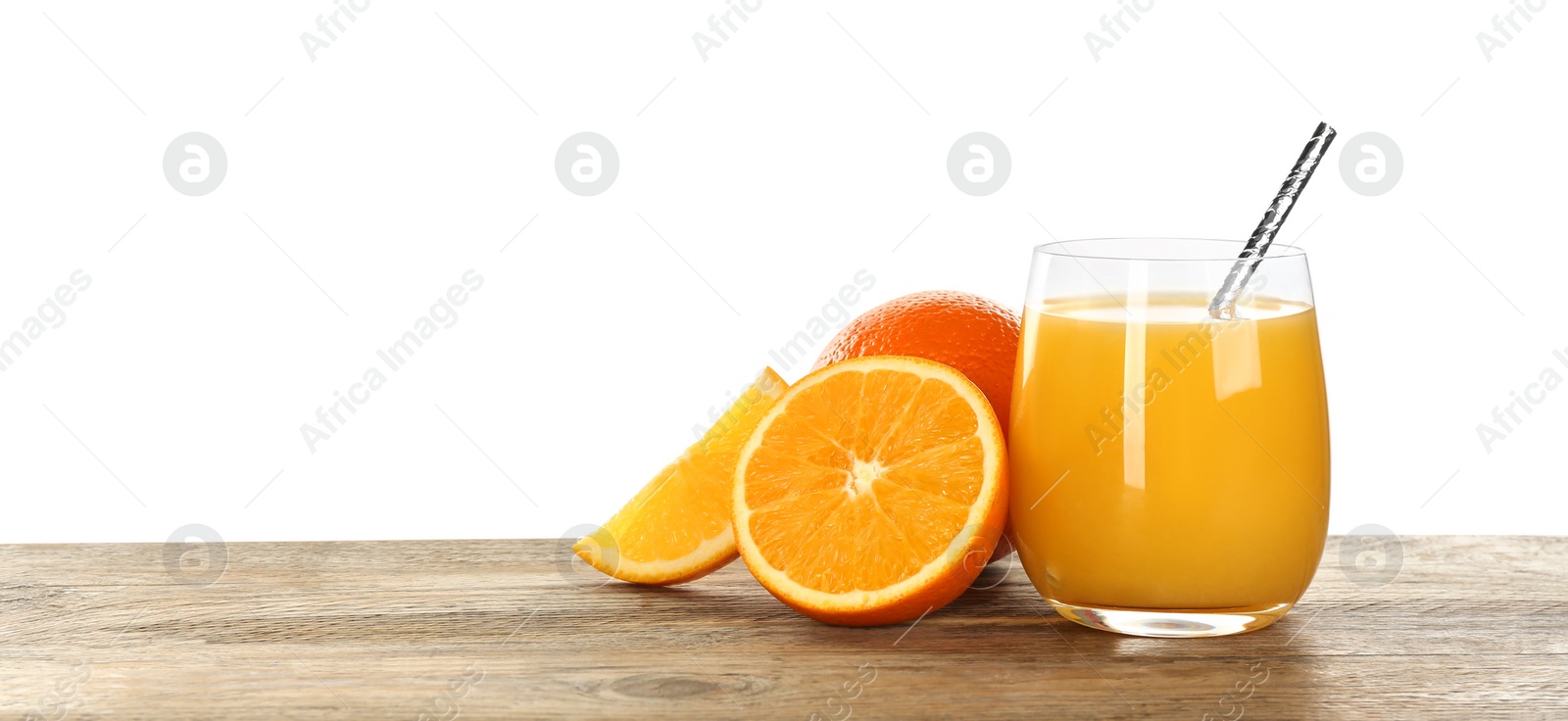 Photo of Delicious orange juice and fresh fruits on wooden table against white background. Space for text