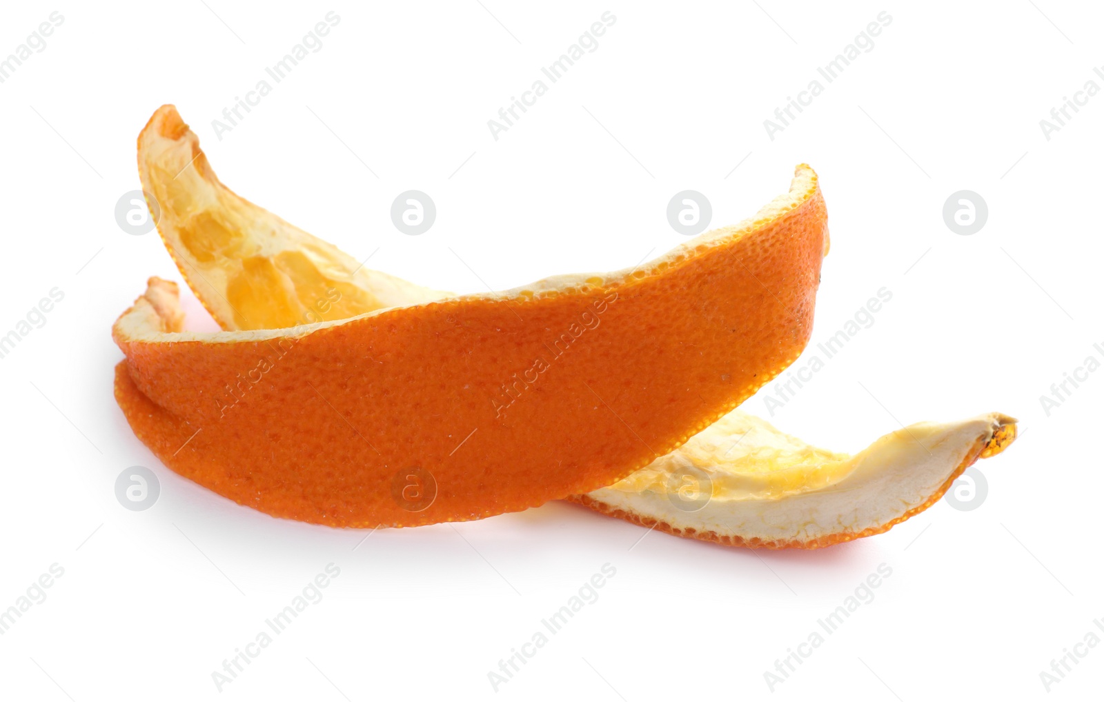 Photo of Dry orange fruit peels on white background