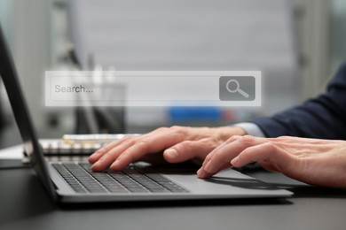 Search bar of website over laptop. Man using computer at black table, closeup